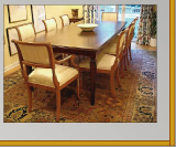 Mahogany finished table with custom painted chairs trimmed with gold leaf